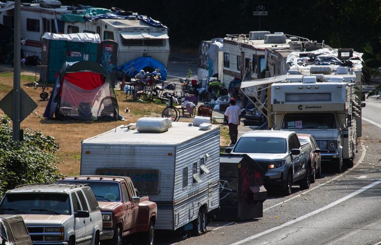 A permitted RV community is seen Wednesday, Aug. 31, 2022, in Olympia. The RV residents must soon leave the area. This street is near Lacey City Hall that once had its own RV community, but it was forced out by a parking law that was challenged and is now being decided by the Washington Supreme Court.