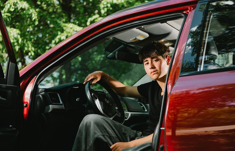 – EMBARGO: NO ELECTRONIC DISTRIBUTION, WEB POSTING OR STREET SALES BEFORE 5:01 A.M. ET ON SATURDAY, JULY 6, 2024. NO EXCEPTIONS FOR ANY REASONS – Milo Richtel, who is learning to  drive and hopes to get a license when he turns 16, in his family’s Toyota Highlander in Boulder, Colo., May 24, 2024. A reporter wonders if his son, a new driver, can learn from the examples set by the Tesla robot controlling the steering wheel – or should it be the other way around?  (James Stukenberg/The New York Times) XNYT0931 XNYT0931