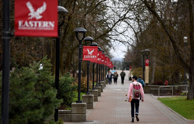 Students walk through campus between classes on Friday, April 12, 2019, in Cheney, Wash. EWU says it’s facing a $3.6 million budget shortfall.    

Tyler Tjomsland/THE SPOKESMAN-REVIEW