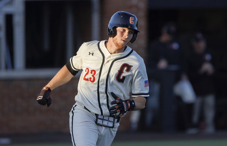 Campbell’s Grant Knipp (23) runs to first base during an NCAA baseball game on Monday, April 10, 2023, in Buies Creek, N.C. (AP Photo/Ben McKeown)