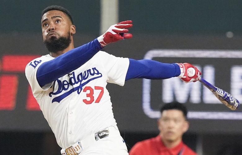 National League’s Teoscar Hernandez, of the Los Angeles Dodgers, follows through during the MLB baseball All-Star Home Run Derby, Monday, July 15, 2024, in Arlington, Texas. (AP Photo/LM Otero) TXMS146 TXMS146