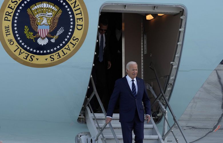 President Joe Biden walks from Air Force One as he arrives at Harry Reid International Airport in Las Vegas, Monday, July 15, 2024. (AP Photo/Susan Walsh) NVSW320 NVSW320