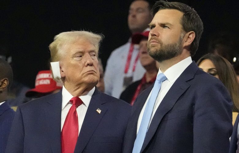 Republican presidential candidate former President Donald Trump appears with vice presidential candidate JD Vance, R-Ohio, during the Republican National Convention Monday, July 15, 2024, in Milwaukee. (AP Photo/Nam Y. Huh) RNC962 RNC962