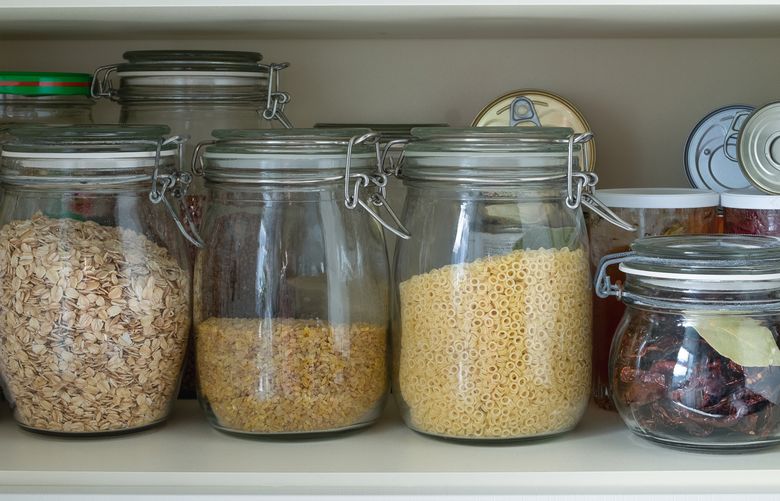 Being able to easily see and access items in the pantry (or the cabinets that function as one) is key. (Getty Images)