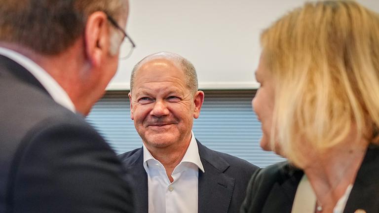 Olaf Scholz mit Boris Pistorius und Nancy Faeser