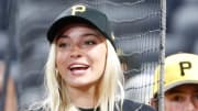 Livvy Dunne signs autographs after the Pittsburgh Pirates defeated the Los Angeles Dodgers at PNC Park.