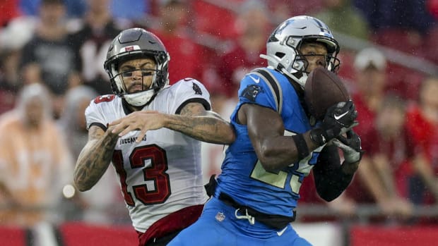 Carolina Panthers safety Xavier Woods (25) intercepts the ball. Nathan Ray Seebeck-USA TODAY Sports