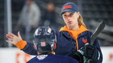 Coachella Valley Firebirds assistant coach Jessica Campbell talks to Firebirds forward Cameron Hughes (19) during practice at Acrisure Arena in Palm Desert, Calif., on Tuesday, May 28, 2024.