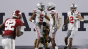 Jan. 11, 2021; Miami Gardens, Florida, USA; Ohio State Buckeyes wide receiver Garrett Wilson (5) celebrates catching a 20-yard touchdown with wide receiver Jameson Williams (6) during the third quarter of the College Football Playoff National Championship against the Alabama Crimson Tide at Hard Rock Stadium in Miami Gardens, Fla. Mandatory Credit: Kyle Robertson/The Columbus Dispatch/USA TODAY Network

Ncaa Football Cfp National Championship Ohio State Vs Alabama