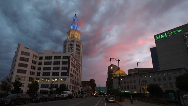 The blue light in the Electric Tower in downtown Buffalo, NY on August 15, 2022 contrasts against the colors from the setting sun.

Sunset Downtown Buffalo