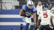 Jan 6, 2024; Indianapolis, Indiana, USA; Indianapolis Colts running back Jonathan Taylor (28) rushes the ball against the Houston Texans at Lucas Oil Stadium. Mandatory Credit: Robert Scheer-USA TODAY Sports