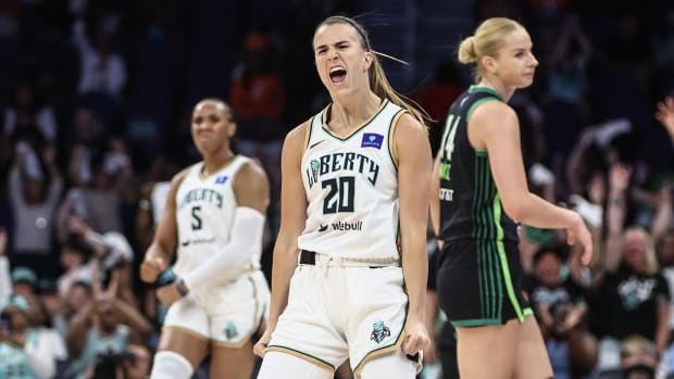 New York Liberty guard Sabrina Ionescu (20) celebrates after making a three point shot against the Minnesota Lynx