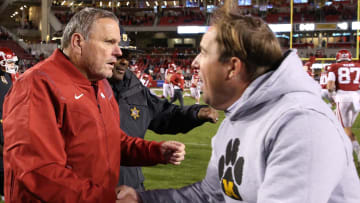 Arkansas Razorbacks coach Sam Pittman shakes hands with Missouri Tigers coach Eil Drinkwitz after the game at Razorback Stadium. Arkansas won 34-17. 