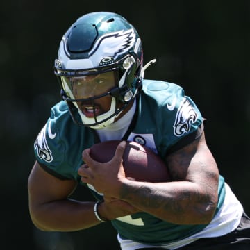 May 30, 2024; Philadelphia, PA, USA; Philadelphia Eagles running back Kenneth Gainwell (14) runs with the ball during practice at NovaCare Complex. Mandatory Credit: Bill Streicher-USA TODAY Sports