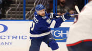 April 9, 2024; Tampa, Florida, USA; Tampa Bay Lightning center Steven Stamkos (91) passes the puck against the Columbus Blue Jackets during the third period at Amalie Arena.