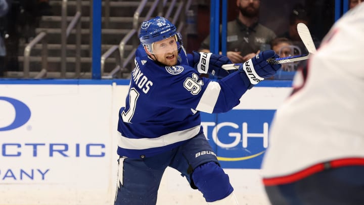 April 9, 2024; Tampa, Florida, USA; Tampa Bay Lightning center Steven Stamkos (91) passes the puck against the Columbus Blue Jackets during the third period at Amalie Arena.