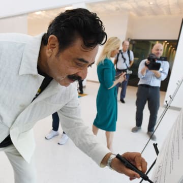 Jacksonville Jaguars owner Shad Khan and Jacksonville Mayor Donna Deegan sign copies of a proclamation on the new stadium agreement ahead of Wednesday's event. Jacksonville Jaguars owner Shad Khan, Jaguars president Mark Lamping, Jacksonville Mayor Donna Deegan and the city of Jacksonville's chief negotiator on the stadium deal Mike Weinstein met at the Jaguars Miller Electric Center Wednesday, June 26, 2024 to address the media and team personnel about the newly approved stadium renovation