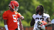 Browns quarterback Jameis Winston (5) and running back D'Onta Foreman talk during minicamp, Tuesday, June 11, 2024, in Berea.