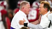 Nov 4, 2023; Tuscaloosa, Alabama, USA; Alabama Crimson Tide head coach Nick Saban greets LSU Tigers head coach Brian Kelly midfield before their game at Bryant-Denny Stadium. Mandatory Credit: John David Mercer-USA TODAY Sports