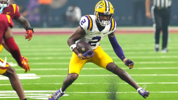 Sep 1, 2024; Paradise, Nevada, USA; LSU Tigers wide receiver Kyren Lacy (2) runs with the ball against the Southern California Trojans during the second quarter at Allegiant Stadium. Mandatory Credit: Stephen R. Sylvanie-USA TODAY Sports