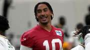 Jun 11, 2024; Green Bay, WI, USA; Green Bay Packers quarterback Jordan Love (10) exercises alongside teammates at minicamp. 