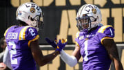 LSU wide receiver Ja'Marr Chase (1) reacts to scoring a touchdown against Vanderbilt with wide receiver Justin Jefferson (2) during the first half at Vanderbilt Stadium in Nashville, Tenn., Saturday, Sept. 21, 2019.