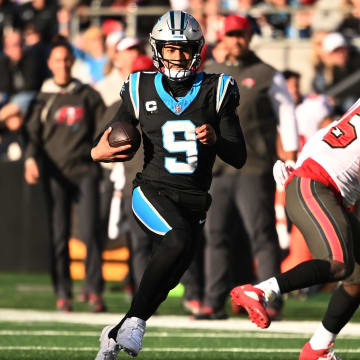 Jan 7, 2024; Charlotte, North Carolina, USA;  Carolina Panthers quarterback Bryce Young (9) scrambles in the fourth quarter at Bank of America Stadium. Mandatory Credit: Bob Donnan-USA TODAY Sports