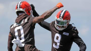 Browns defensive backs Greg Newsome II (0) and Grant Delpit celebrate a pass breakup during minicamp, Thursday, June 13, 2024, in Berea.