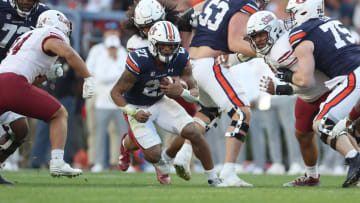 Nov 18, 2023; Auburn, Alabama, USA;  Auburn Tigers running back Jarquez Hunter (27) scrambles for