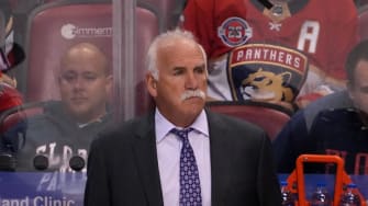 Oct 27, 2021; Sunrise, Florida, USA; Florida Panthers head coach Joel Quenneville stands behind the bench during the first period between the Florida Panthers and the Boston Bruins at FLA Live Arena.
