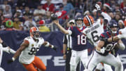 Dec 24, 2023; Houston, Texas, USA; Houston Texans quarterback Case Keenum (18) attempts a pass as Cleveland Browns linebacker Jeremiah Owusu-Koramoah (6) defends during the game at NRG Stadium. Mandatory Credit: Troy Taormina-USA TODAY Sports