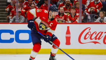 May 26, 2024; Sunrise, Florida, USA; Florida Panthers center Aleksander Barkov (16) moves the puck against the New York Rangers during the third period in game three of the Eastern Conference Final of the 2024 Stanley Cup Playoffs at Amerant Bank Arena. Mandatory Credit: Sam Navarro-USA TODAY Sports