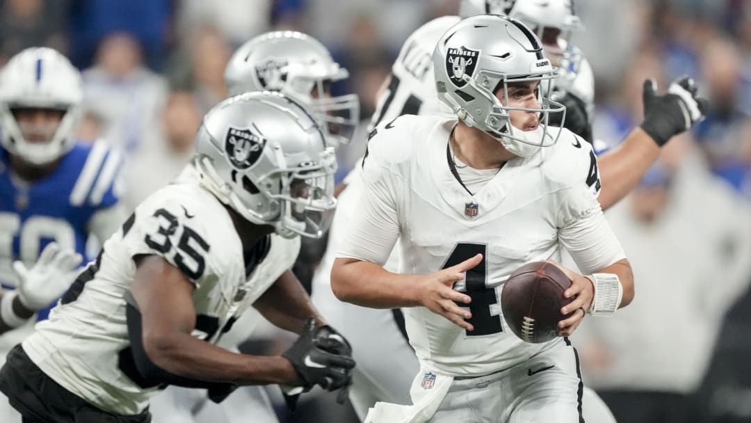 Dec 31, 2023; Indianapolis, Indiana, USA; Las Vegas Raiders quarterback Aidan O'Connell (4) draws back with the ball during a game against the Las Vegas Raiders at Lucas Oil Stadium. Mandatory Credit: Bob Scheer-USA TODAY Sports