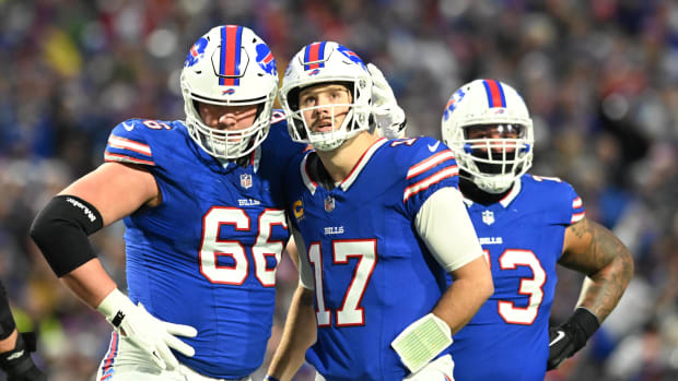 Dec 17, 2023; Orchard Park, New York, USA; Buffalo Bills guard Connor McGovern (66) talks with quarterback Josh Allen (17) in the first half against the Dallas Cowboys at Highmark Stadium. Mandatory Credit: Mark Konezny-USA TODAY Sports