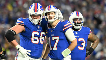 Dec 17, 2023; Orchard Park, New York, USA; Buffalo Bills guard Connor McGovern (66) talks with quarterback Josh Allen (17) in the first half against the Dallas Cowboys at Highmark Stadium. Mandatory Credit: Mark Konezny-USA TODAY Sports