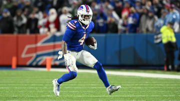 Dec 17, 2023; Orchard Park, New York, USA; Buffalo Bills running back James Cook (4) runs the ball in the second half against the Dallas Cowboys at Highmark Stadium. Mandatory Credit: Mark Konezny-USA TODAY Sports