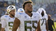 Nov 18, 2023; Tempe, Arizona, USA; Oregon Ducks offensive lineman Ajani Cornelius (65) against the Arizona State Sun Devils at Mountain America Stadium.