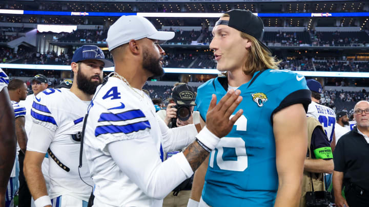 Aug 12, 2023; Arlington, Texas, USA;  Dallas Cowboys quarterback Dak Prescott (4) greets Jacksonville Jaguars quarterback Trevor Lawrence (16) after the game at AT&T Stadium. Mandatory Credit: Kevin Jairaj-USA TODAY Sports