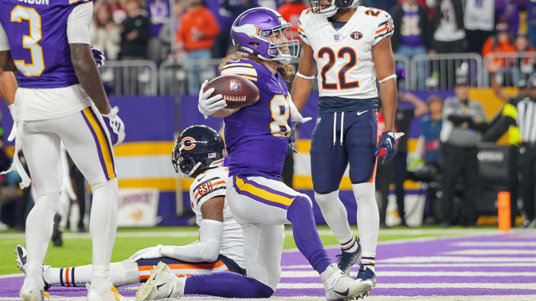 Nov 27, 2023; Minneapolis, Minnesota, USA; Minnesota Vikings tight end T.J. Hockenson (87) celebrates his touchdown against the Chicago Bears in the fourth quarter at U.S. Bank Stadium.