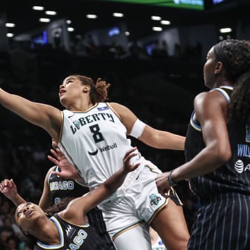 May 23, 2024; Brooklyn, New York, USA;  New York Liberty forward Nyara Sabally (8) drives past Chicago Sky guard Dana Evans (11) in the first quarter at Barclays Center. Mandatory Credit: Wendell Cruz-USA TODAY Sports