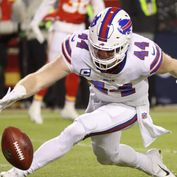 Bills Tyler Matakevich knocks a punt back and is downed at the one-yard-line.