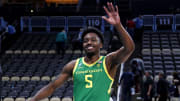 Mar 21, 2024; Pittsburgh, PA, USA; Oregon Ducks guard Jermaine Couisnard (5) waves as he walks off the court after the Oregon Ducks beat the South Carolina Gamecocks in the first round of the 2024 NCAA Tournament at PPG Paints Arena.