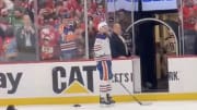 Edmonton Oilers center Connor McDavid waits on the ice as his teammates go through the handshake line following the 2-1 loss to the Florida Panthers in Game 7 of the Stanley Cup Final on Monday night at Amerant Bank Arena in Sunrise, Fla. 