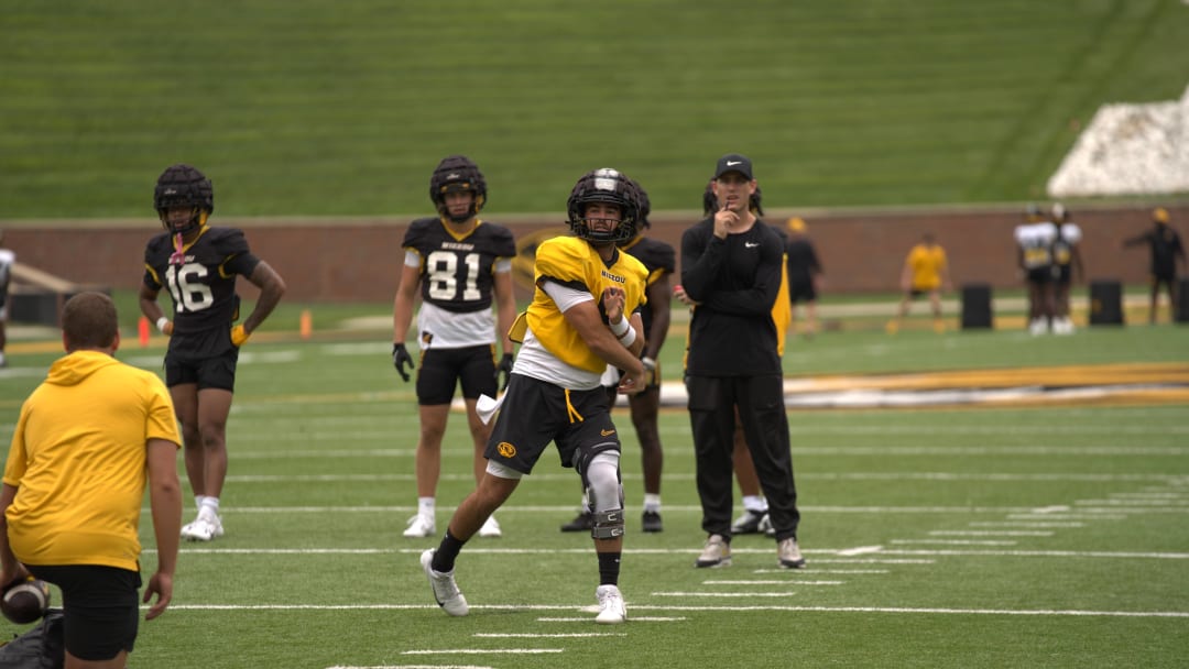 Missouri Tigers quarterback Drew Pyne follows through on a pass during practice at Faurot Field In Columbia, Mo. on Tuesday, August 13, 2024.