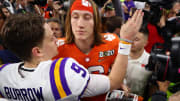 Jan 13, 2020; New Orleans, Louisiana, USA; Clemson Tigers quarterback Trevor Lawrence (right) greets LSU Tigers quarterback Joe Burrow following the College Football Playoff national championship game at Mercedes-Benz Superdome. Mandatory Credit: Mark J. Rebilas-USA TODAY Sports