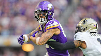 Nov 12, 2023; Minneapolis, Minnesota, USA; Minnesota Vikings wide receiver Jalen Nailor (83) catches a pass against the New Orleans Saints cornerback Alontae Taylor (1) in the third quarter at U.S. Bank Stadium.