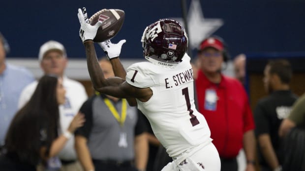 Texas A&M Aggies wide receiver Evan Stewart catches a pass for a touchdown against the Arkansas Razorbacks.