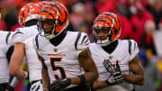 Cincinnati Bengals wide receiver Tee Higgins (5) and wide receiver Ja'Marr Chase (1) run to the outside for a plat in the first quarter of the NFL Week 17 game between the Kansas City Chiefs and the Cincinnati Bengals at Arrowhead Stadium in Kansas City, Mo., on Sunday, Dec. 31, 2023.