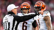 Dec 31, 2023; Kansas City, Missouri, USA; Referee John Hussey (35) directs Cincinnati Bengals wide receiver Ja'Marr Chase (1) to the bench after an altercation in the second quarter during a Week 17 NFL football game between the Cincinnati Bengals and the Kansas City Chiefs at GEHA Field at Arrowhead Stadium. Mandatory Credit: Kareem Elgazzar-USA TODAY Sports