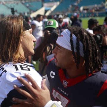 Jacksonville Jaguars quarterback Trevor Lawrence (16) and Houston Texans quarterback C.J. Stroud (7) talk after the game of an NFL football matchup Sunday, Sept. 24, 2023 at EverBank Stadium in Jacksonville, Fla. The Houston Texans defeated the Jacksonville Jaguars 37-17. [Corey Perrine/Florida Times-Union]